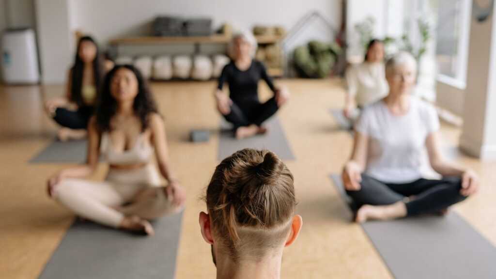 Woman In Meditation Class