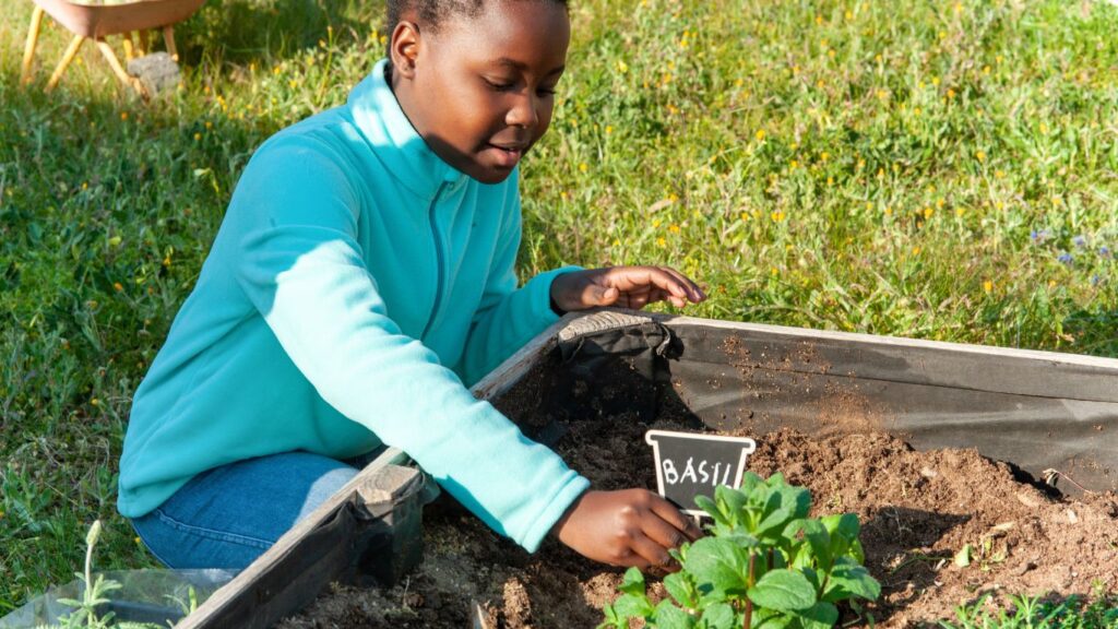 Young Girl Planting|